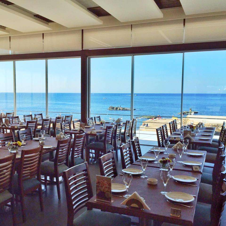 Waterfront dining at Feluka, Sporting Club Beach